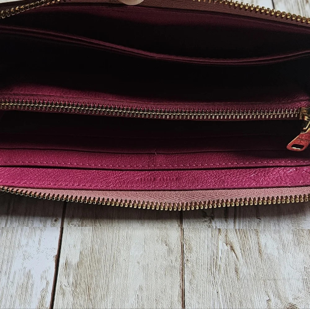 Miu Miu Pink Wallet with Elegant Zip Closure